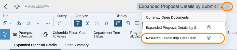Image of application header, with the down-facing arrow circled and the drop-down displayed the current open documents. Research Leadership Data Dash... is circled.